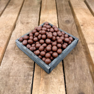Billes de maïs soufflé enrobées de chocolat au lait